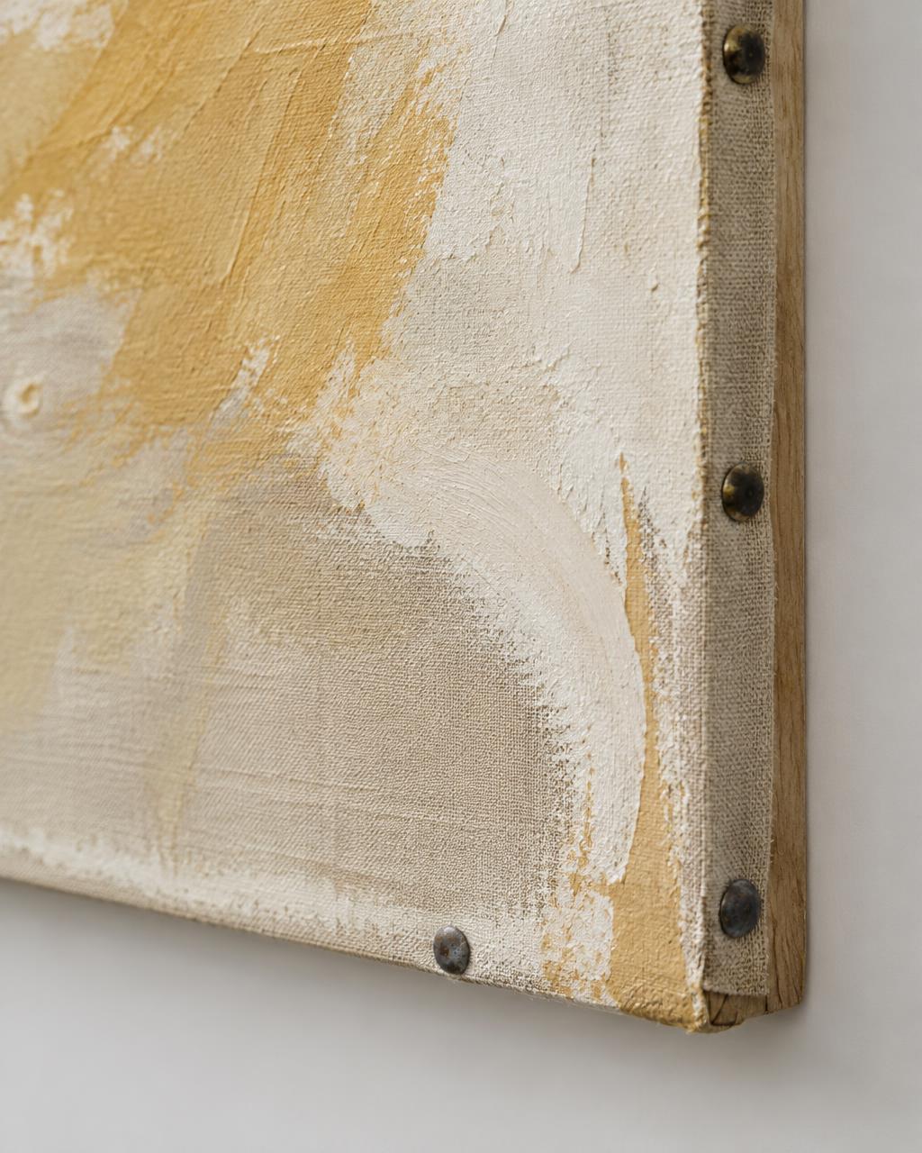 Close view of the painted edge of a stretched linen canvas